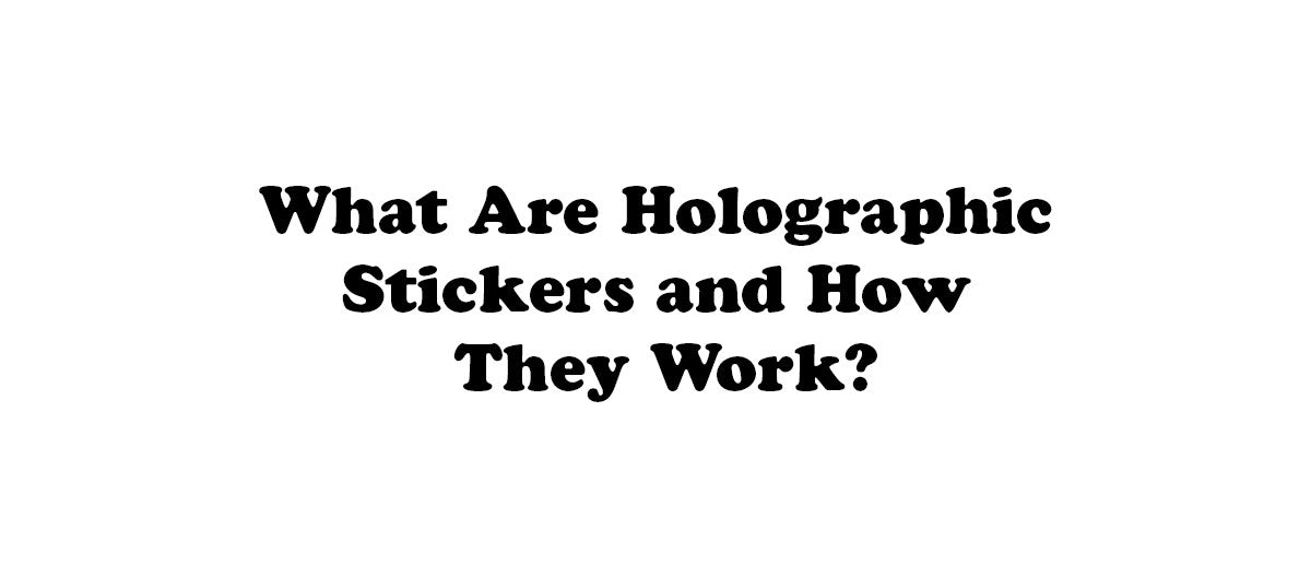 Close-up of printed holographic stickers reflecting rainbow colours in light